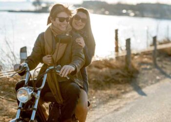 Two people on the moped