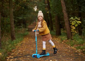 kid on the scooter image